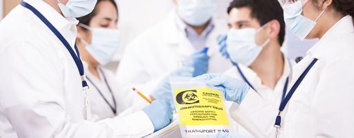 scientists with chemotherapy drug
