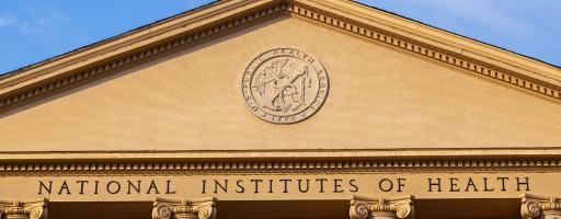Exterior view of the main historic building (Building 1) of National Institutes of Health (NIH) inside Bethesda campus.